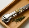 Sunflower relief metal food tongs, home kitchen anti-scald tongs, vegetable tongs, creative sunflower decorative food tongs, kitchen multi-functional tongs, meal tongs wholesale Application Scenario